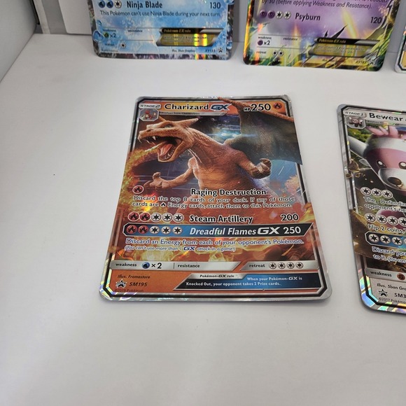 jumbo pokemon card charizard - 4/102 (CoroCoro Promo)/102 - Holofoil Cards Fire Raging Out GX Discard the top 10 cards of your opponents deck Sell Charizard GX (Jumbo) (Holo)